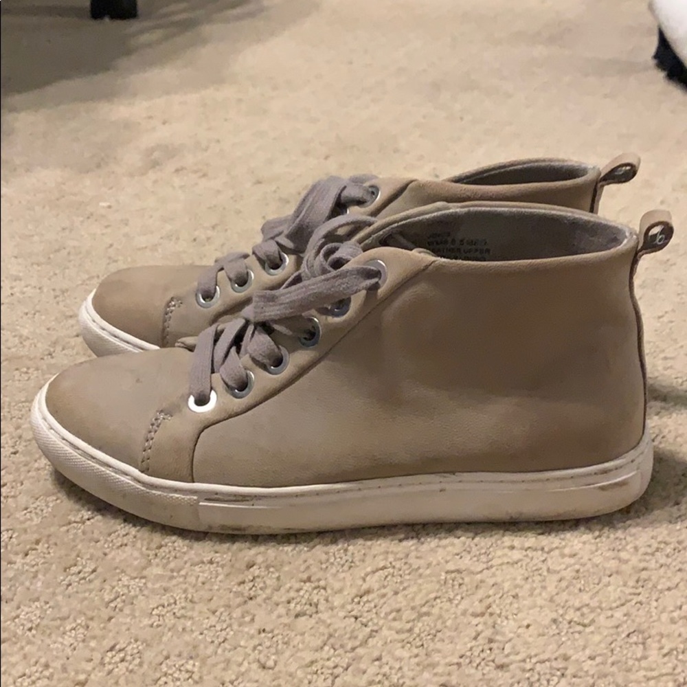 High top tan tennis shoes